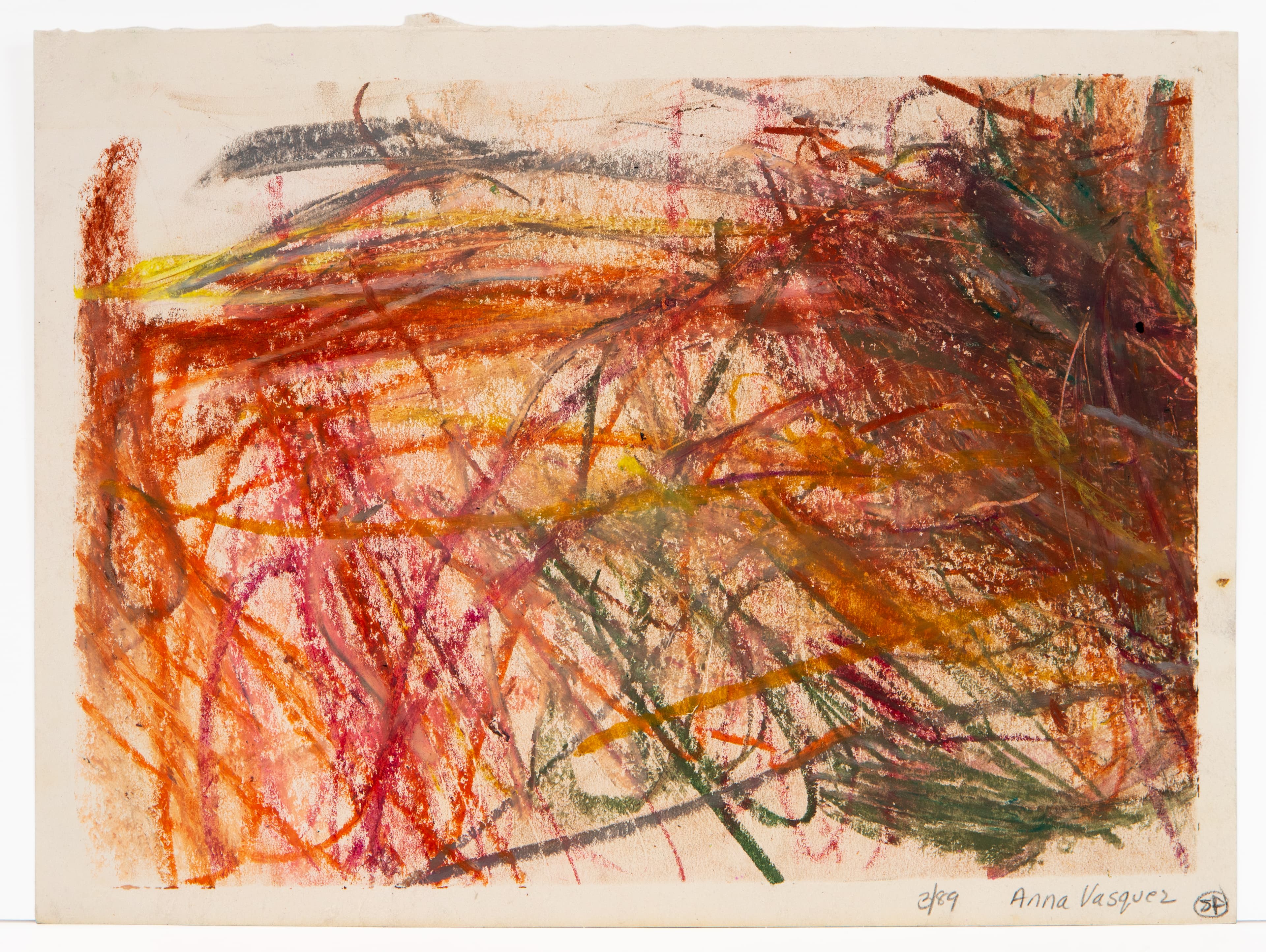 Abstract drawing with energetic scribbled lines in orange, red, yellow, and green on white paper