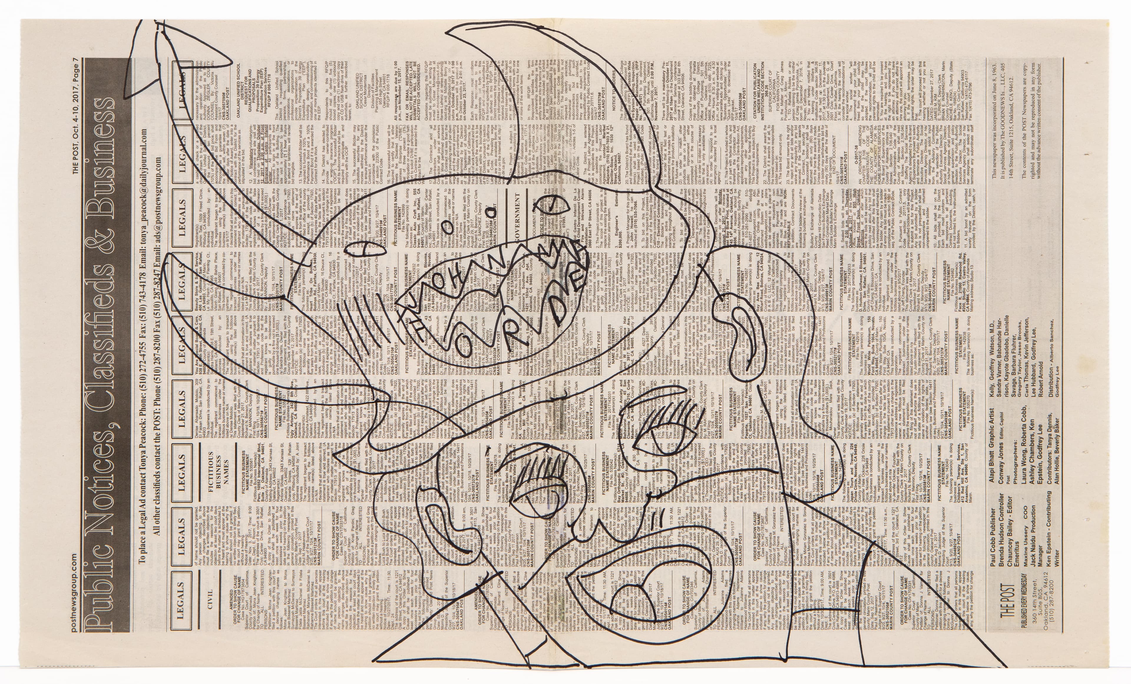 Ink drawing on newspaper showing abstract faces and creatures with flowing lines and eye motifs