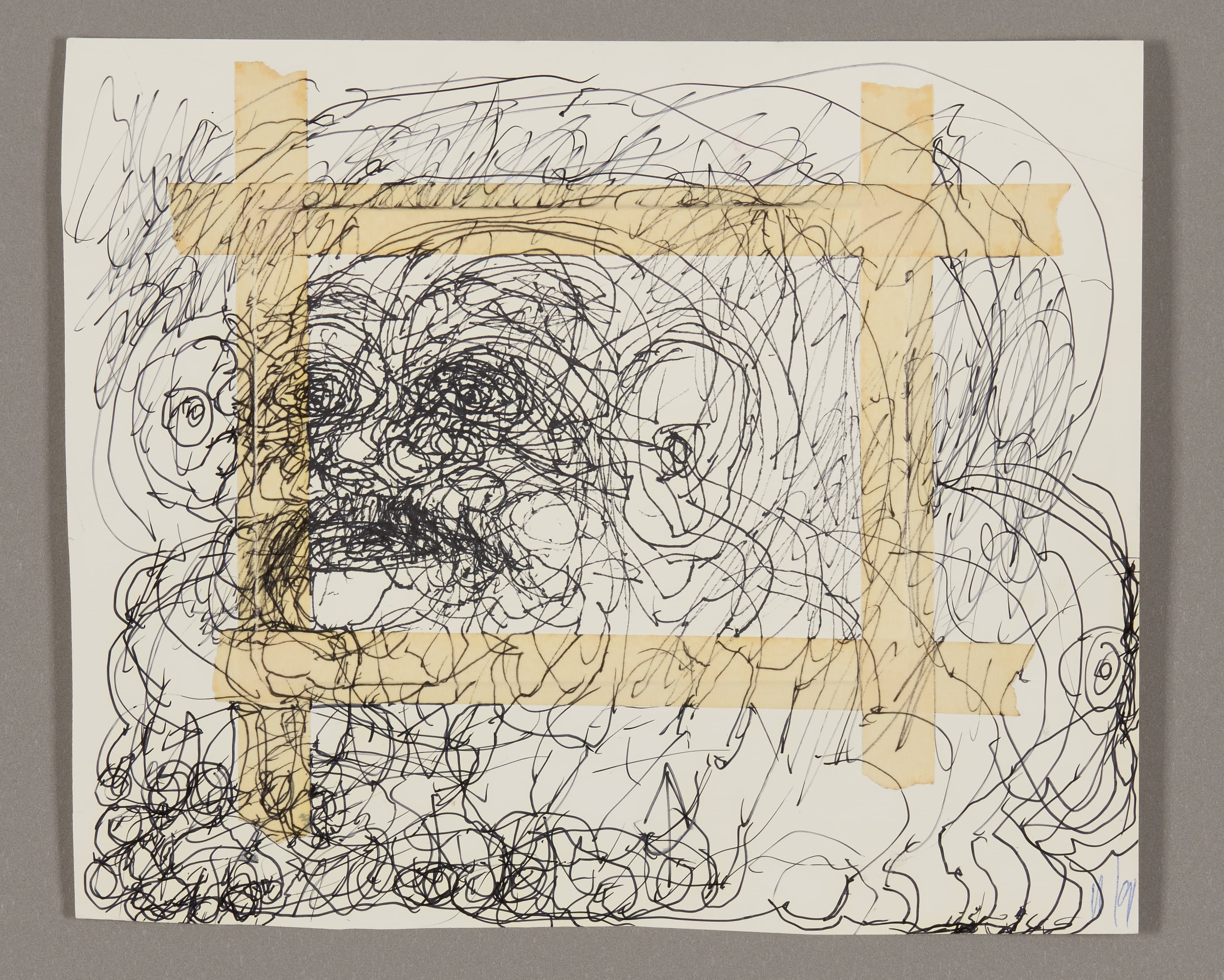 Drawing with dense black ink scribbles forming facial features, yellow masking tape accents on cream paper