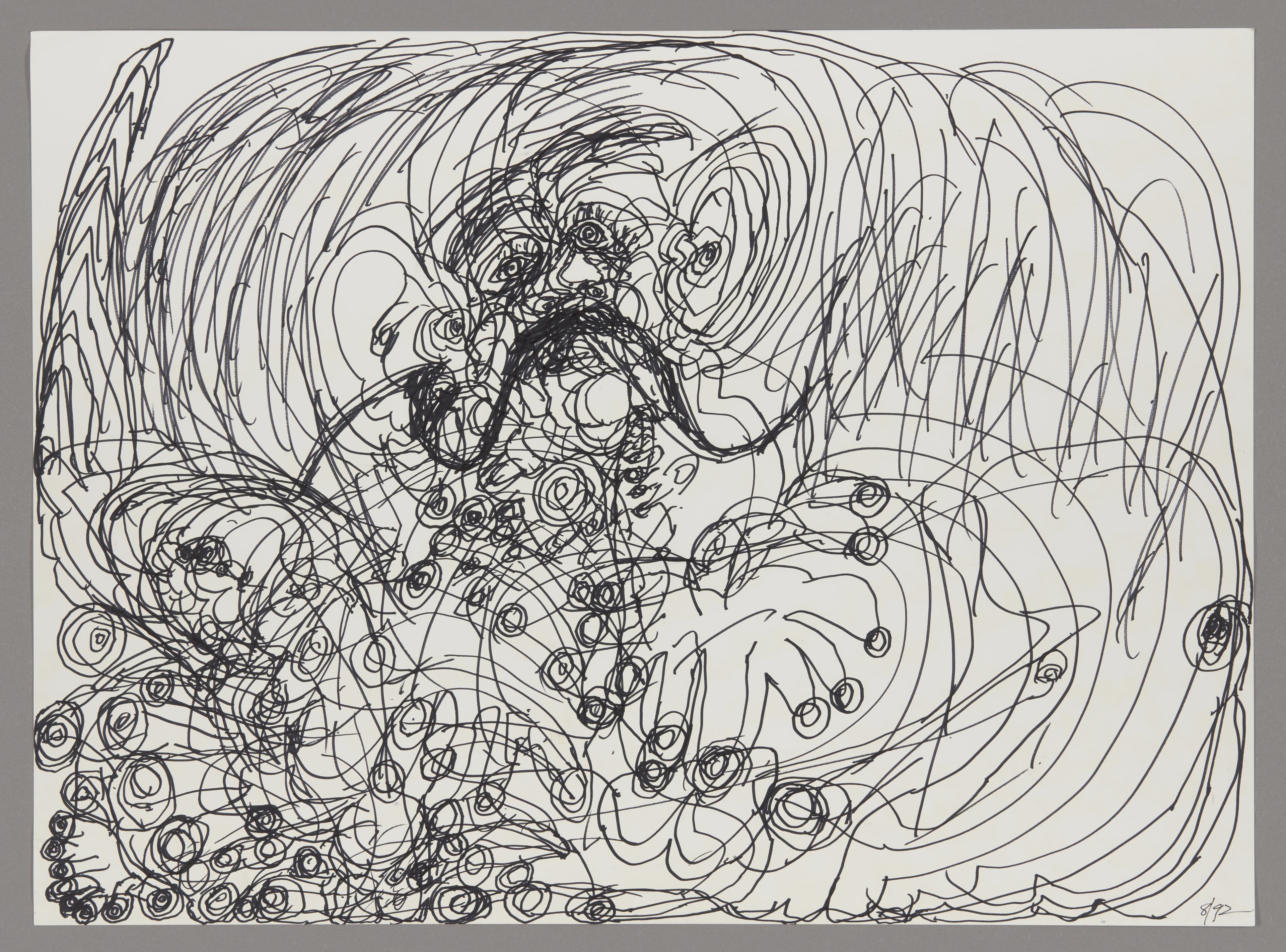 Ink drawing with dense, swirling black lines creating circular and flowing patterns across white paper