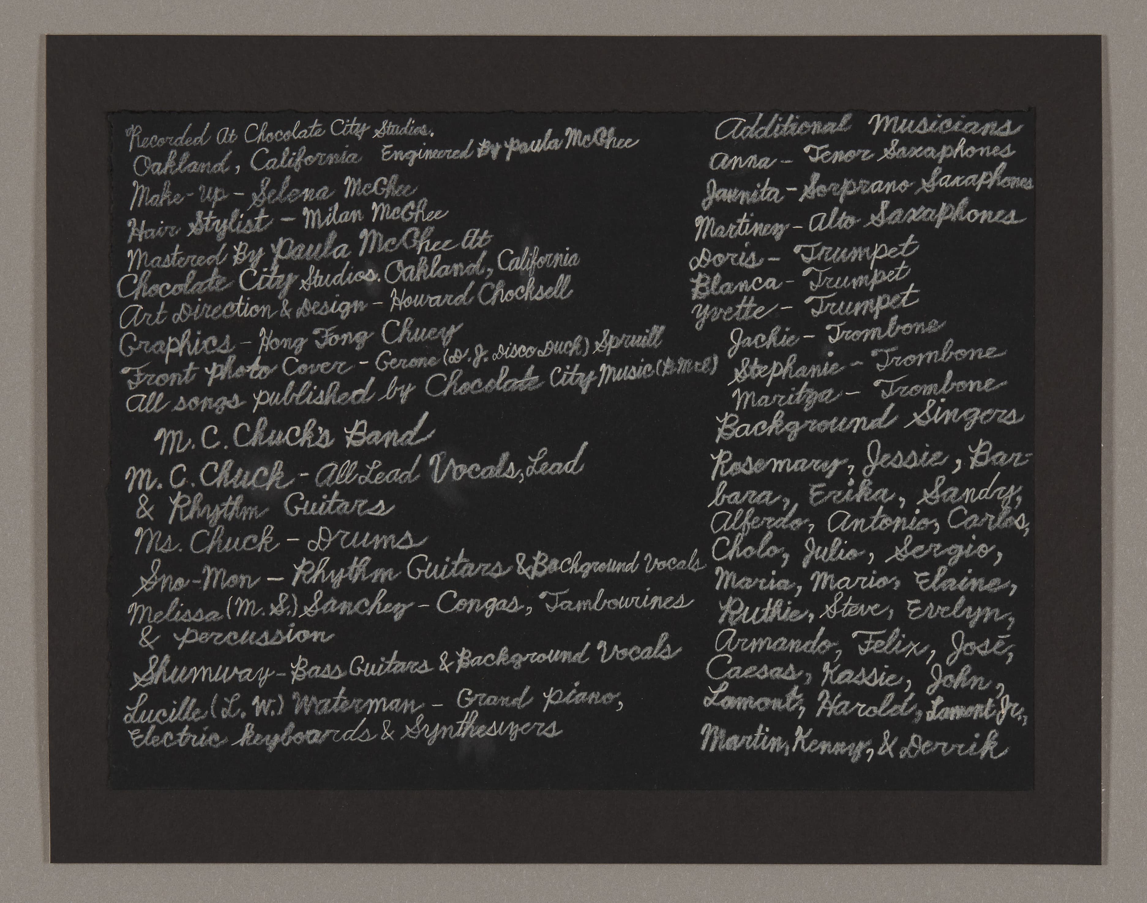 Text artwork in white cursive writing on black paper listing musicians and band members