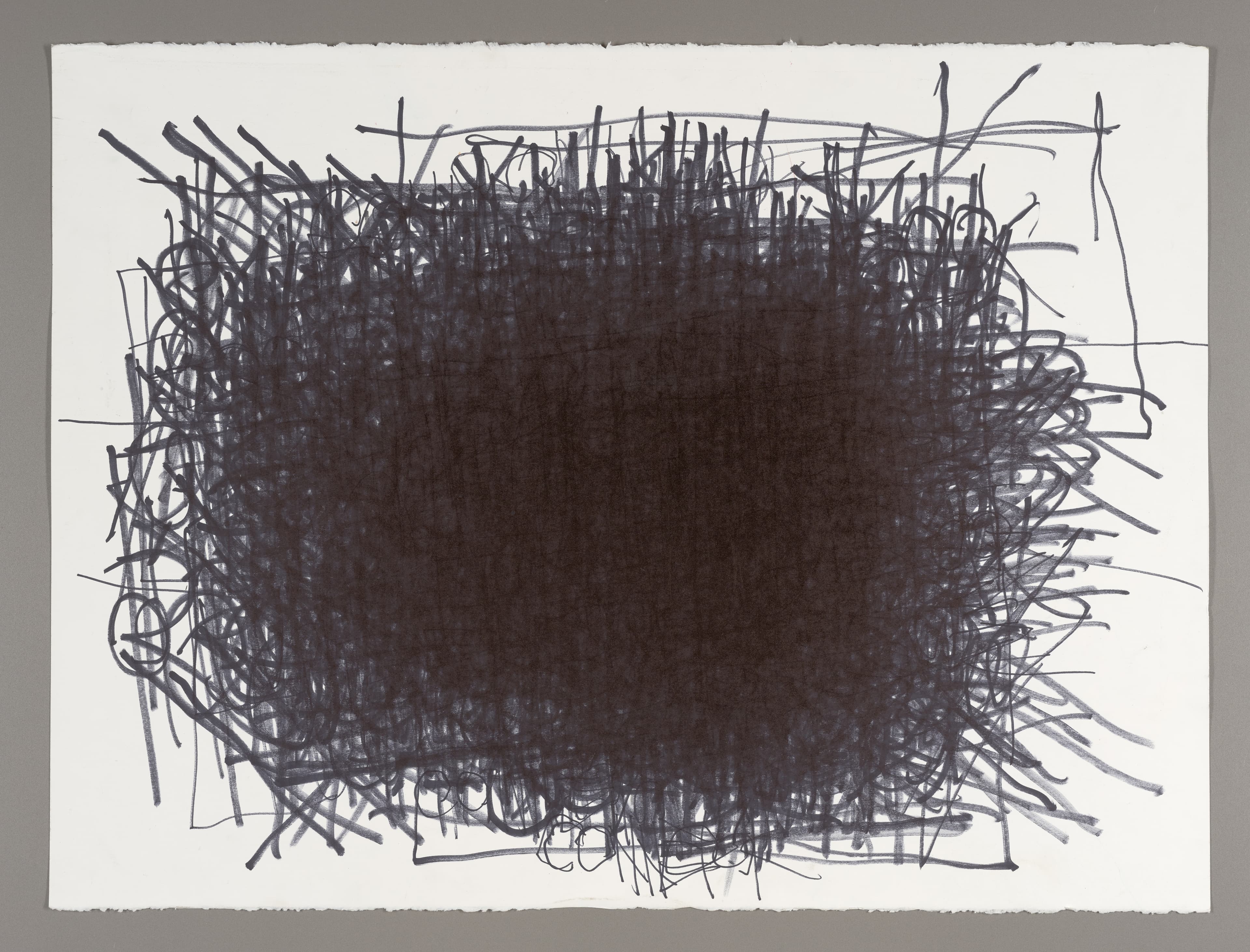 Drawing with dense black scribbled mass in center surrounded by linear marks, Sharpie on white paper