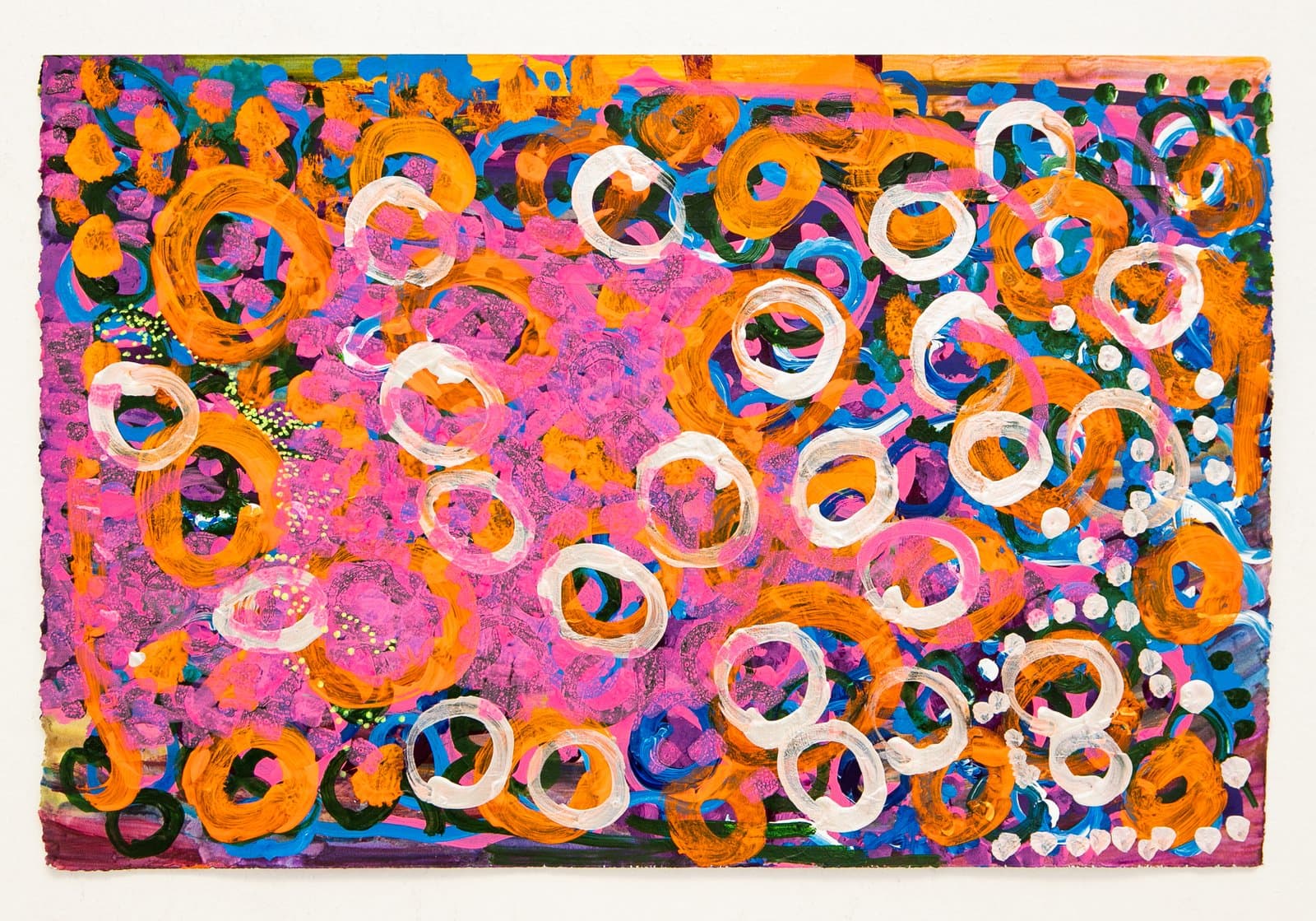 Abstract acrylic painting on paper densely filled with overlapping circles in white, orange, and dark green on a vivid pink and blue ground.