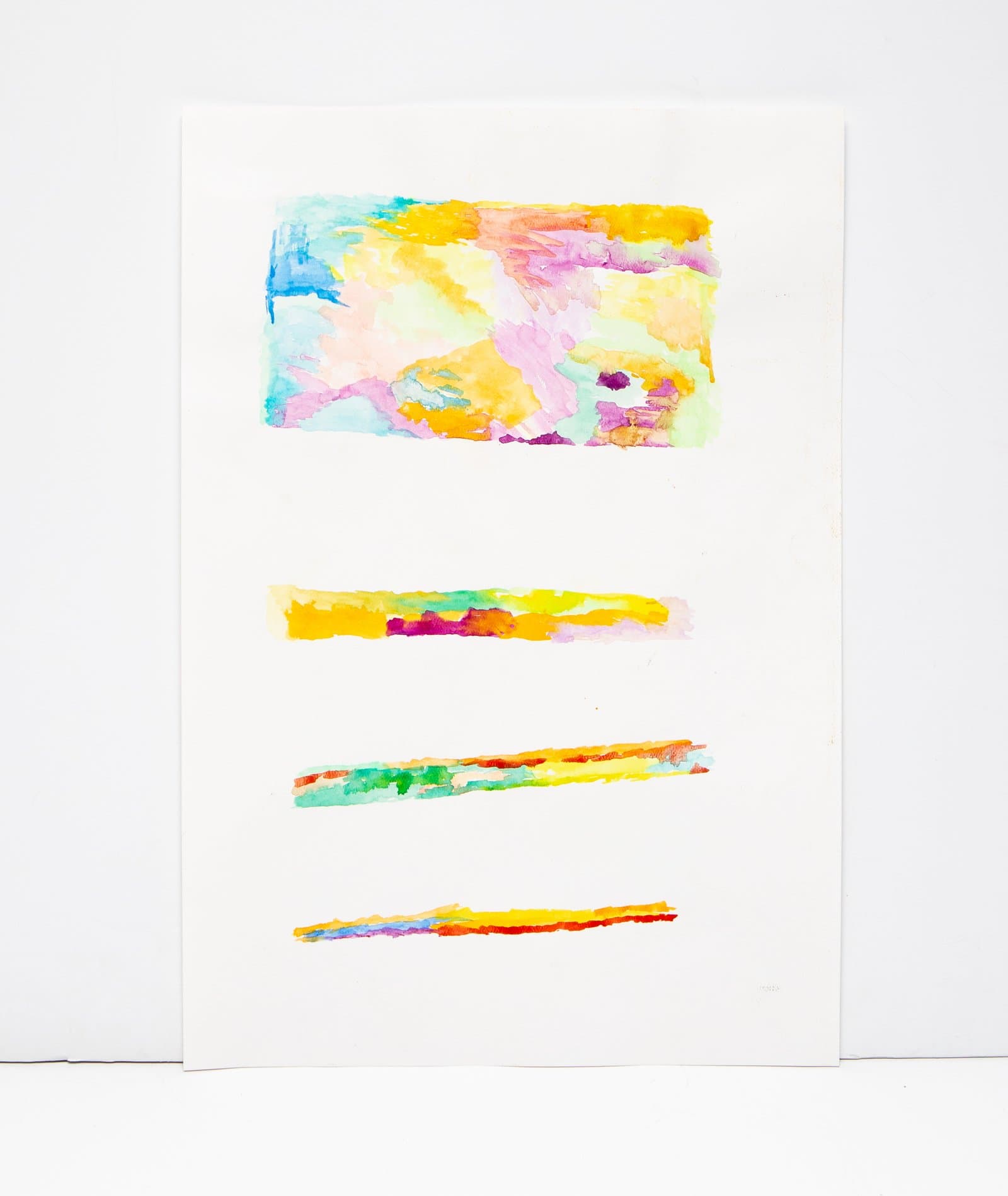 Abstract watercolor on white paper featuring one large rectangular color field above three progressively thinner horizontal bands.