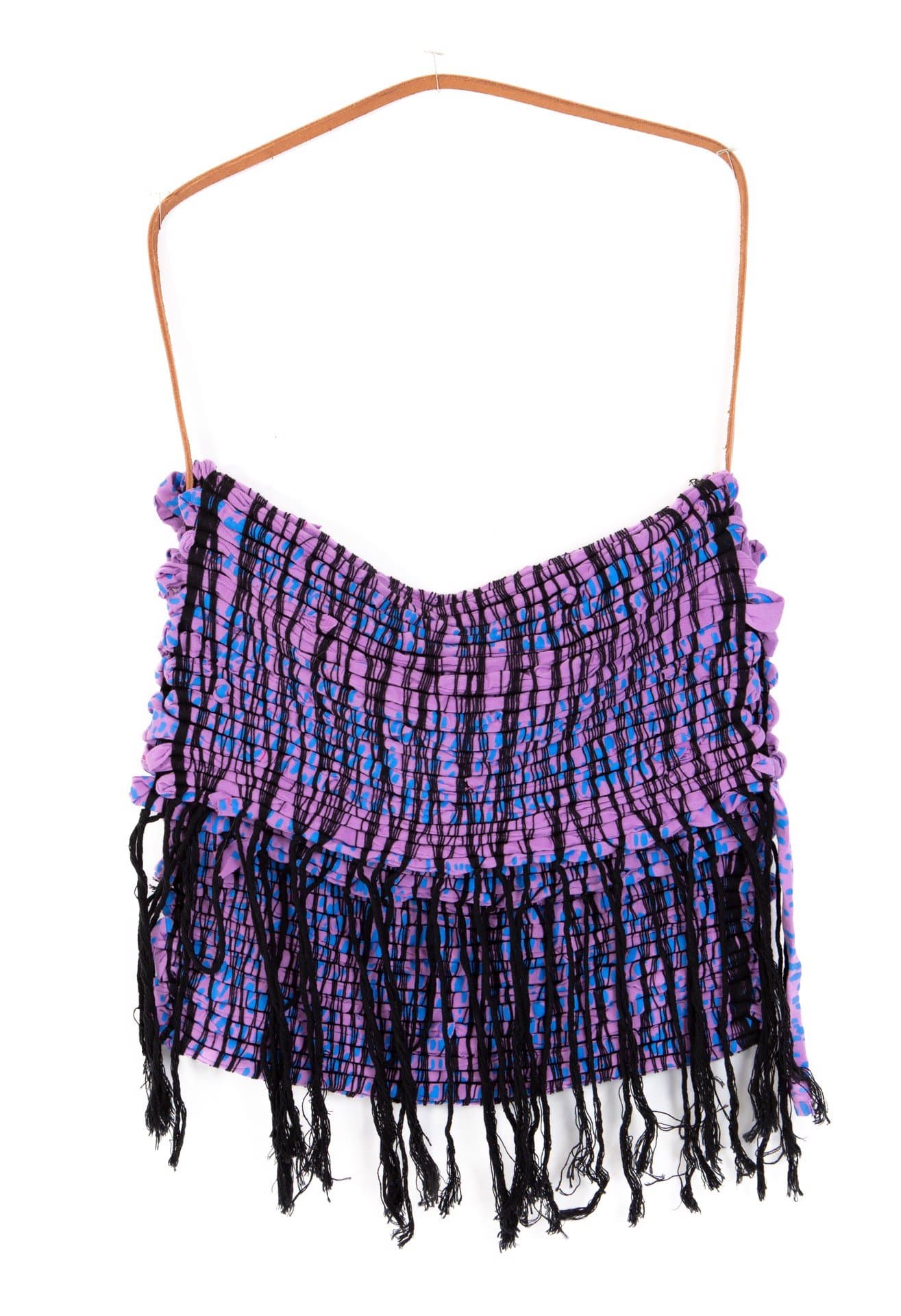 Woven textile bag with copper wire handle featuring purple and blue geometric patterns with black fringe details.