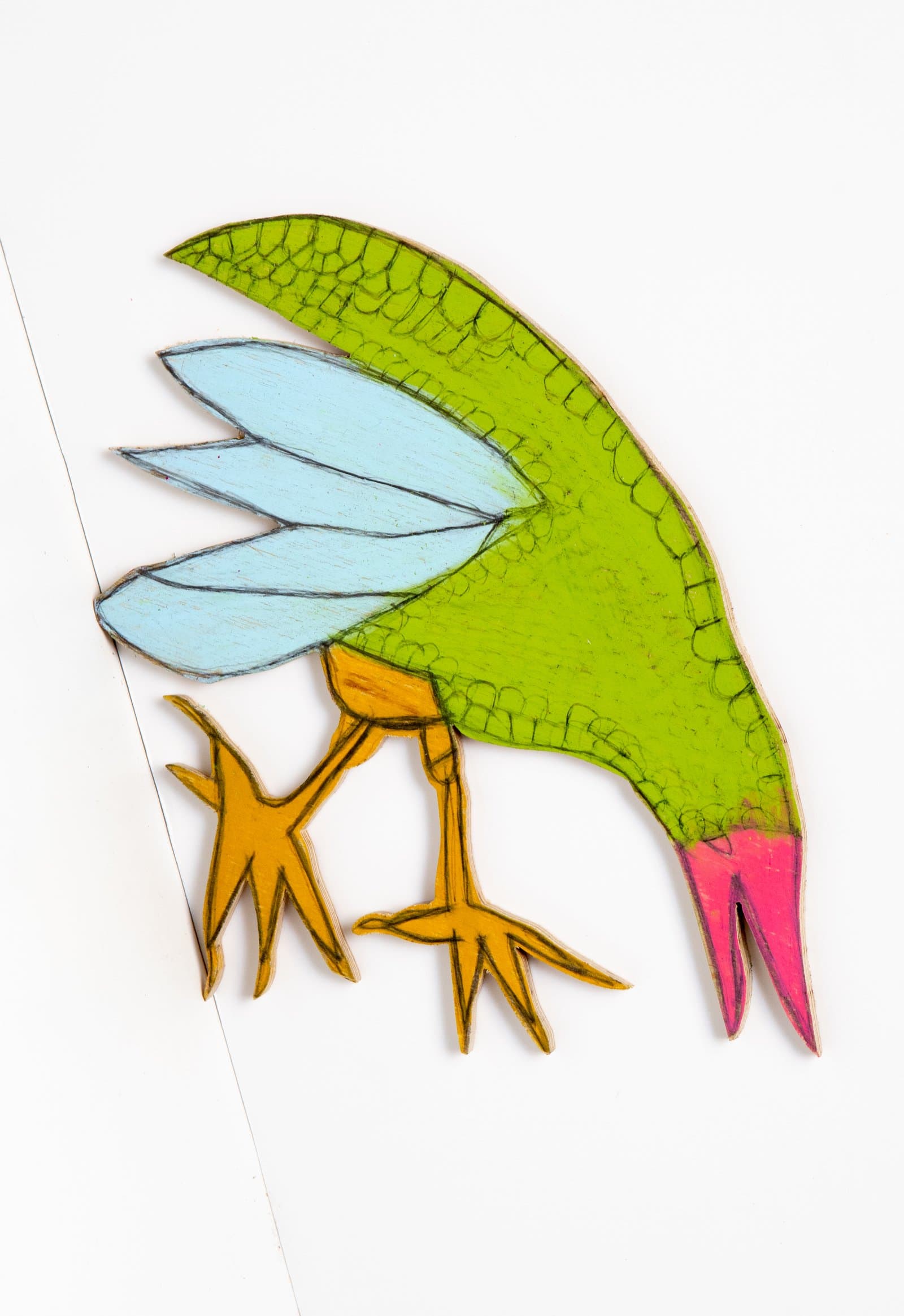 Cut-out wood sculpture of a bird with lime green body, light blue wings, golden legs, and a pink beak.