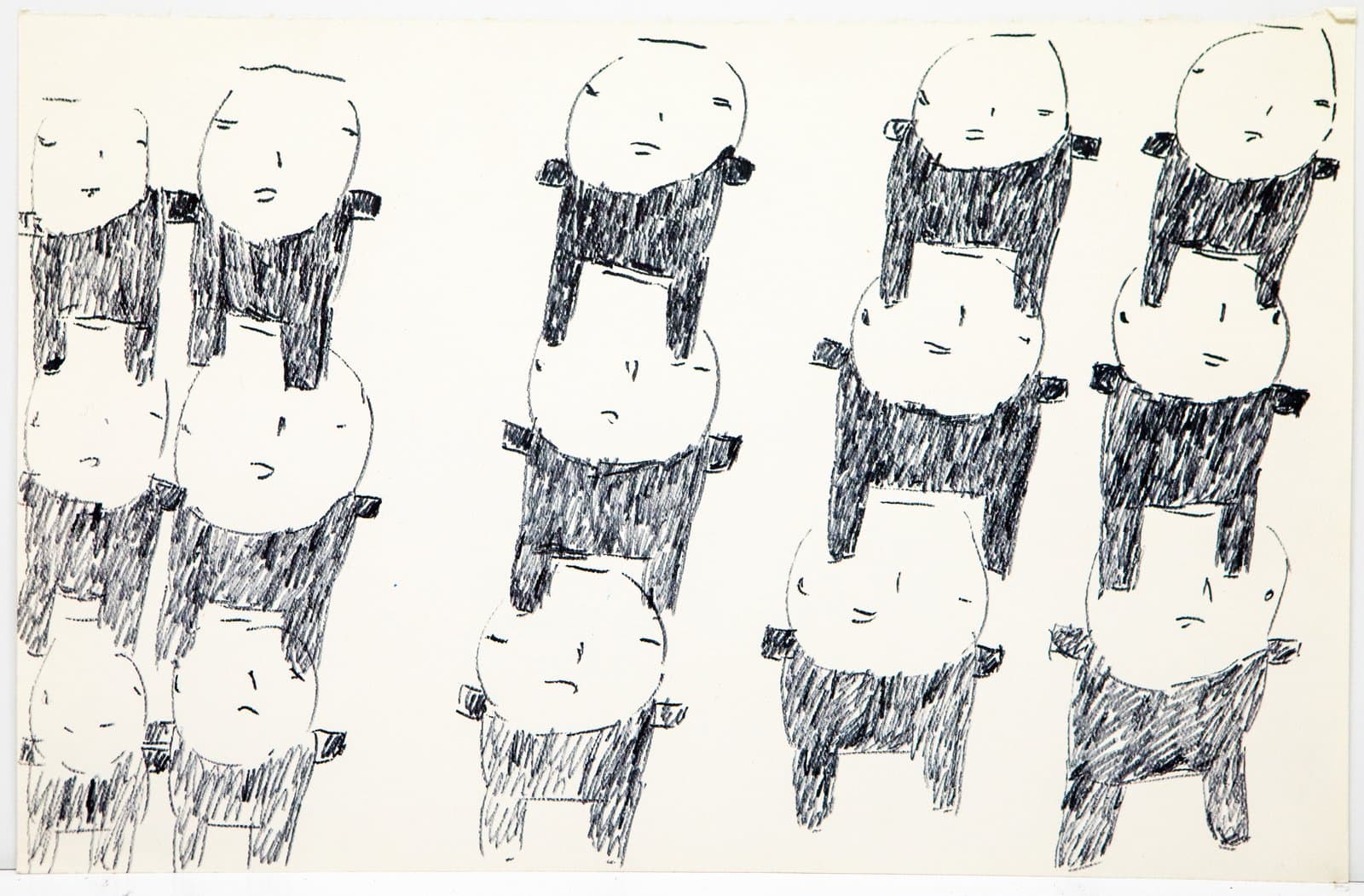 Pen on paper drawing of repeated stacked humanoid figures with round heads arranged in three vertical groupings.