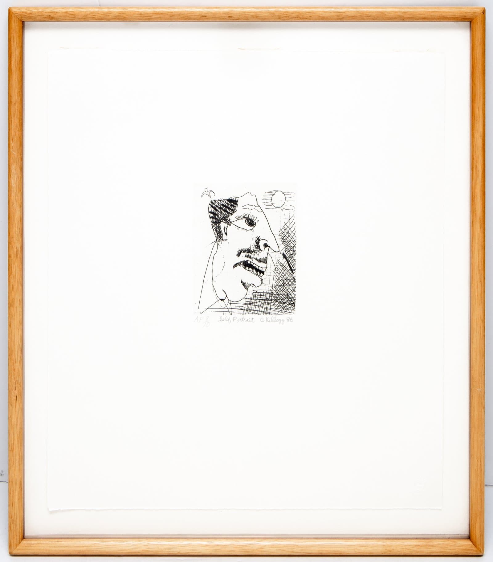 Small framed etching of a face in profile with crosshatched background, a sun, and a bird, in black ink on white paper.
