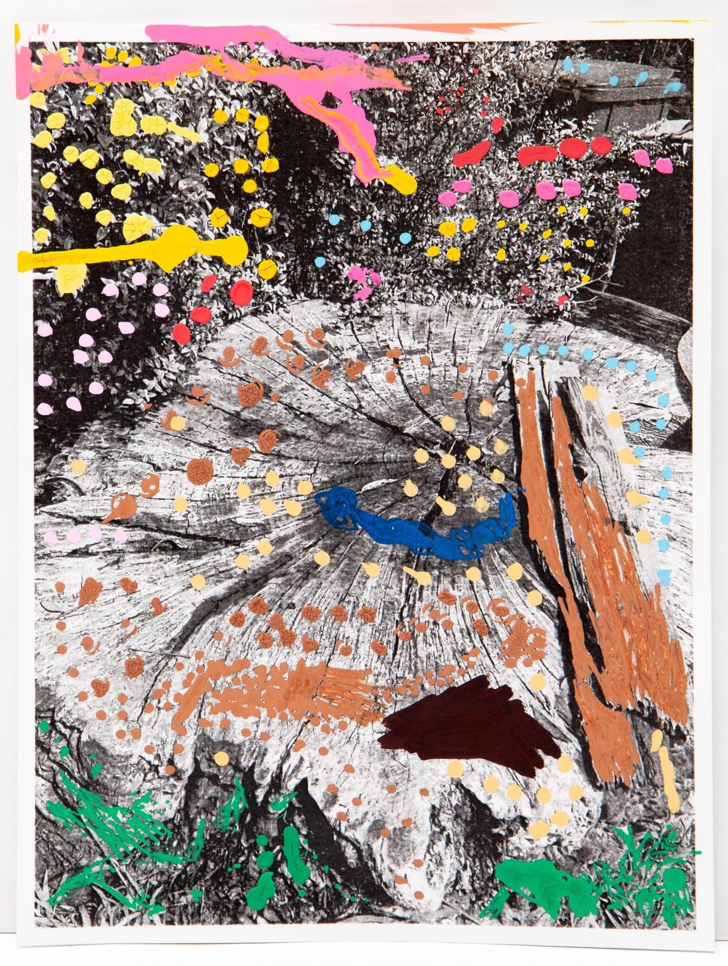 Mixed media artwork with acrylic paint applied over a black and white photograph, featuring colorful dots and brushstrokes.