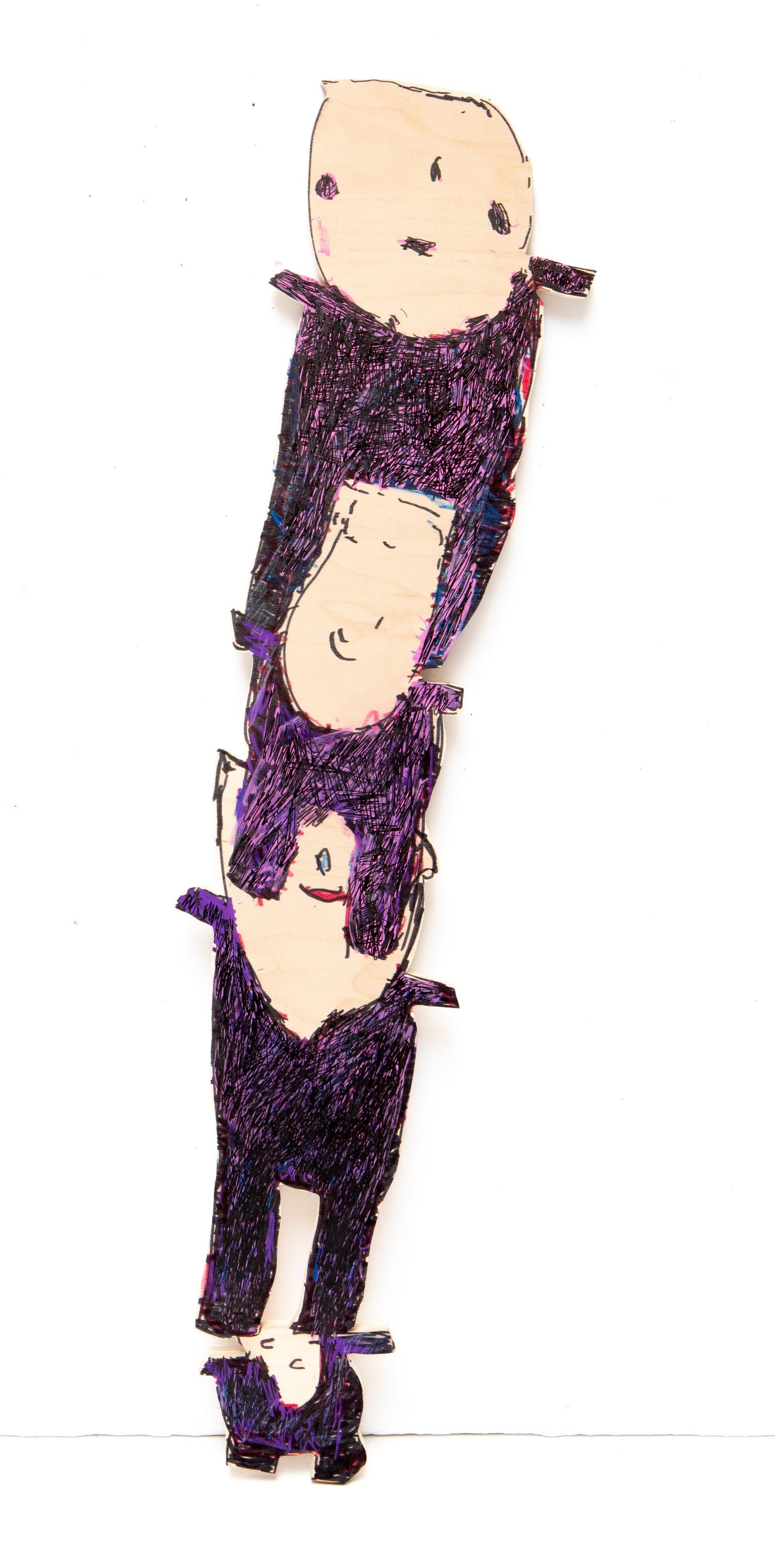 Cut wood figure with three stacked human forms drawn in purple and black ink with peach-toned faces on white background.