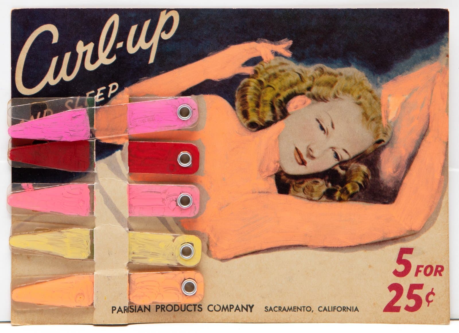 Mixed-media work on a vintage "Curl-up" hair curler card; ink-painted finger-like forms in pink, red, and yellow overlay a reclining woman.