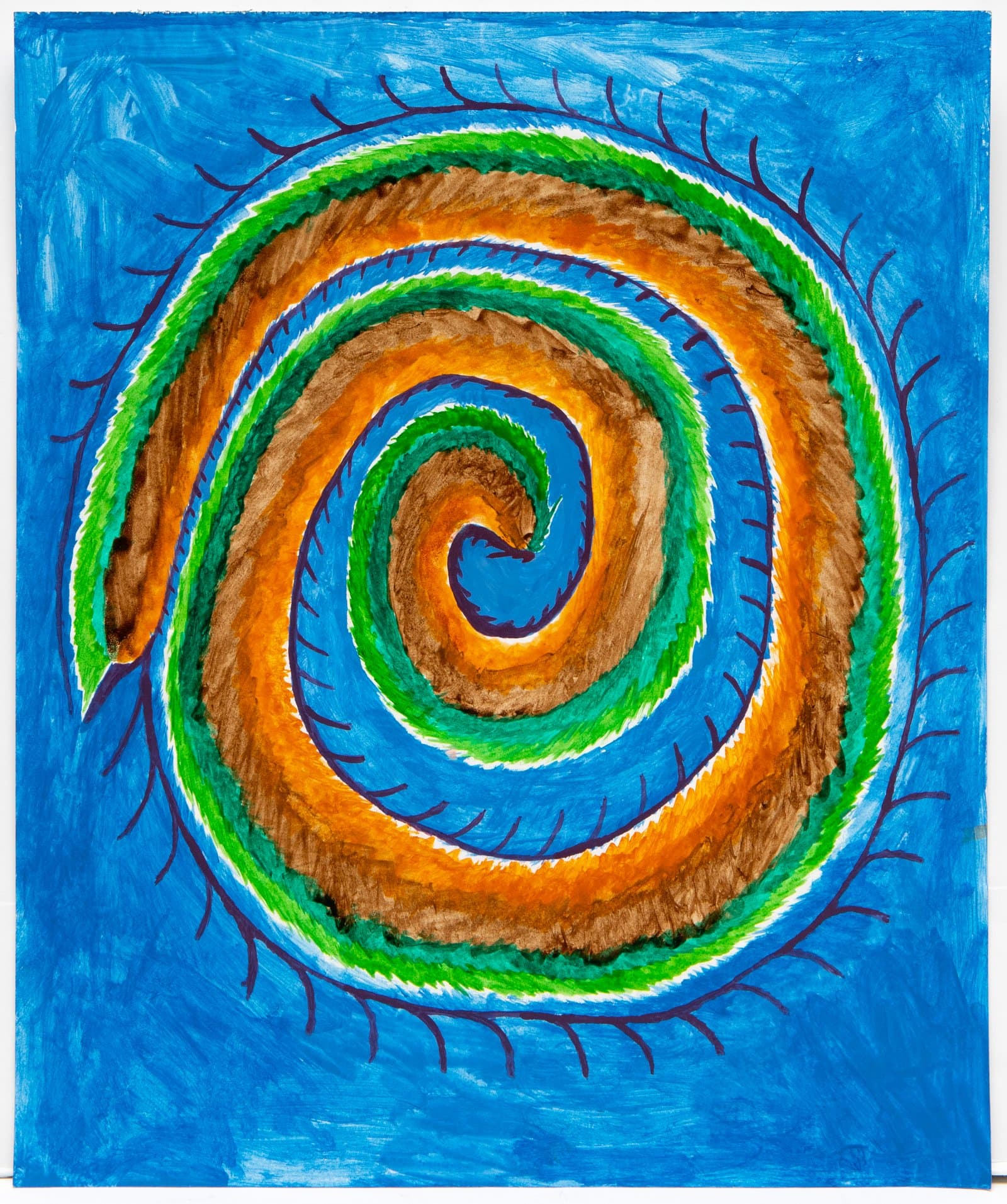 Watercolor painting of a coiled snake in spiral form with green, orange, brown, and blue bands on a blue background.