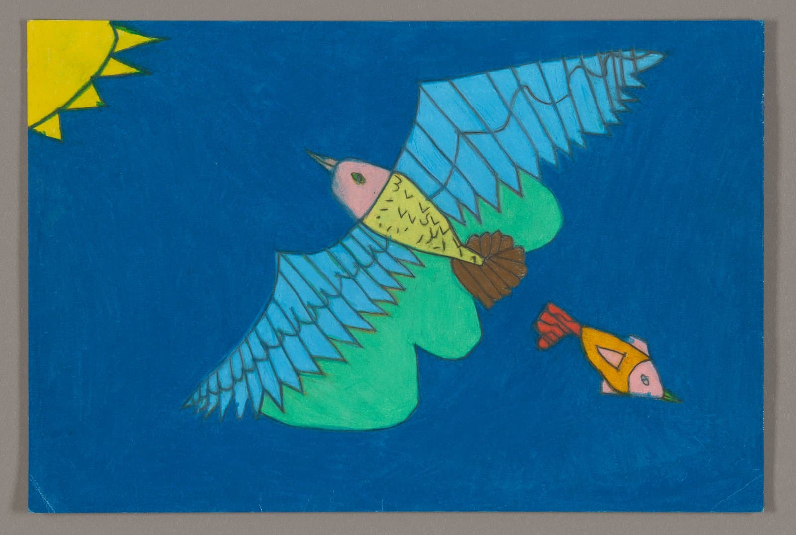 Drawing of green bird with blue wings and smaller yellow bird in flight, colored pencil on blue paper