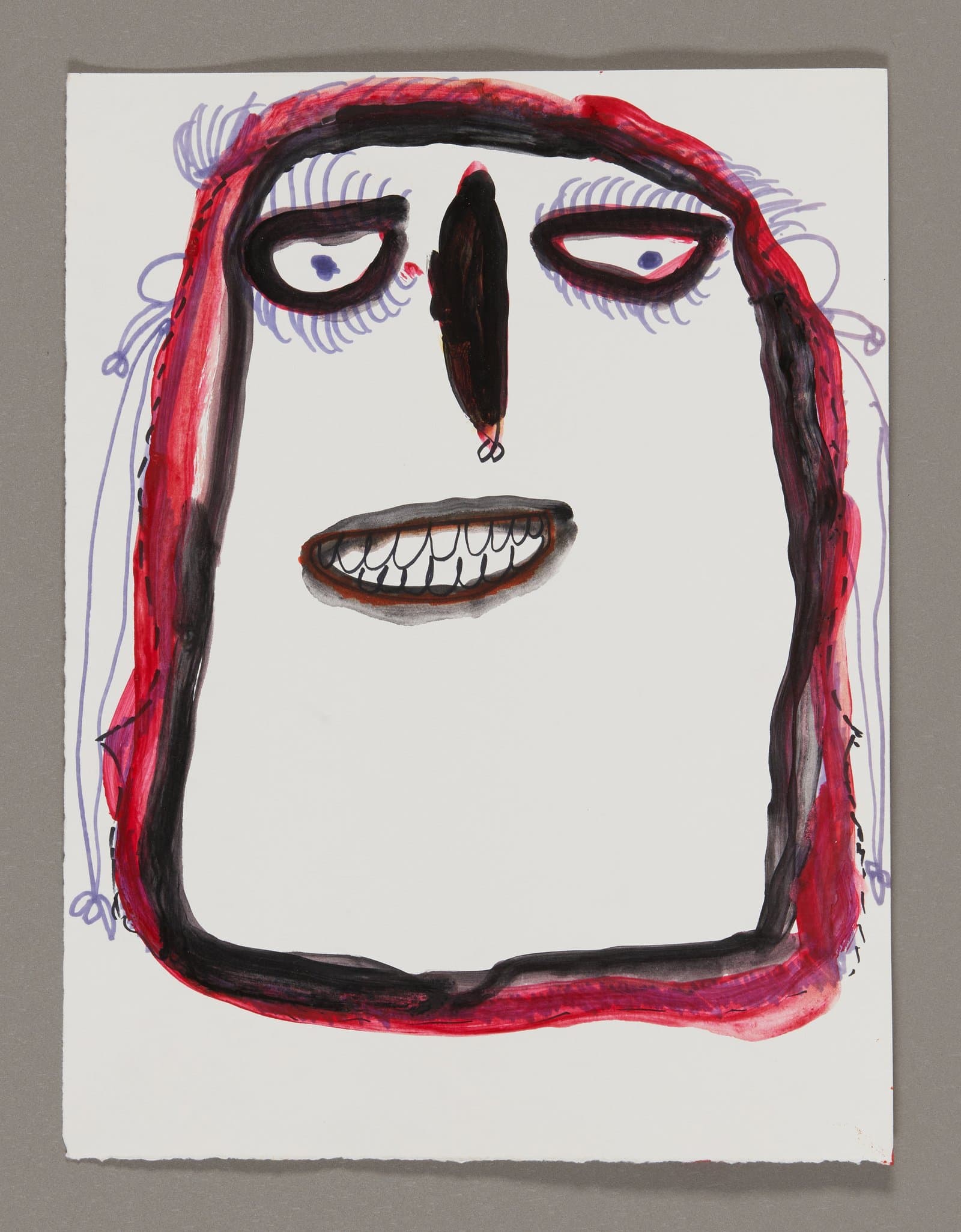 Drawing of a face with red and black hair, purple eyelashes, and white teeth on white paper