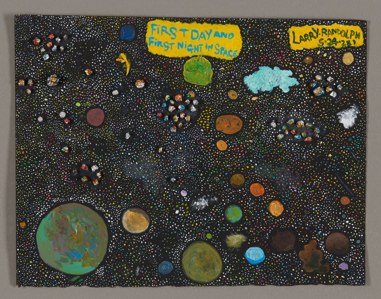 Mixed media artwork depicting space scene with planets, stars, and text on black background