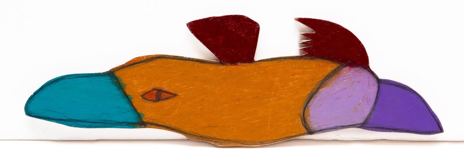 Colorful fish sculpture in Prismastix on wood with orange body, turquoise nose, purple tail, and red dorsal fin.