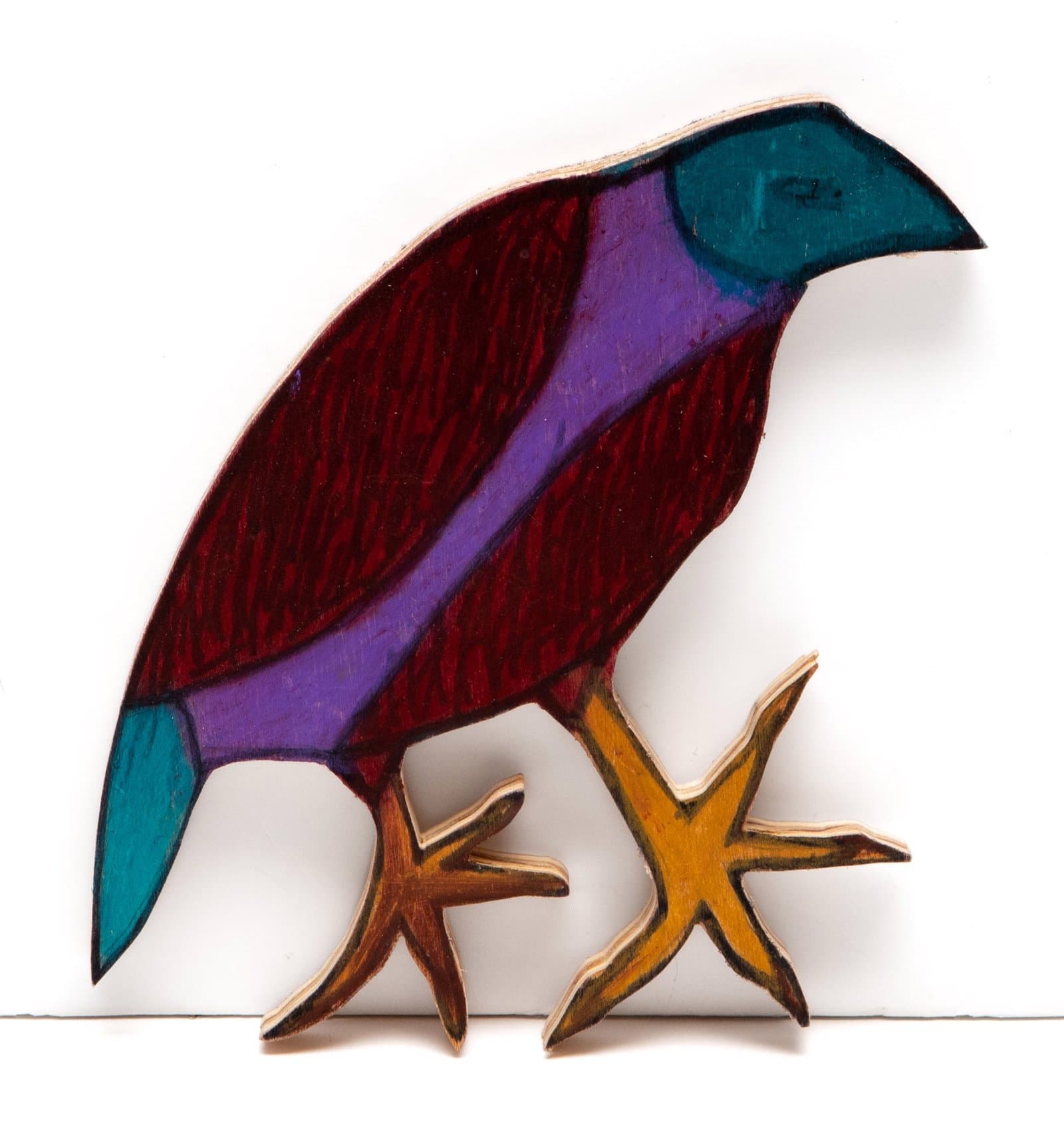 Wooden bird sculpture painted in burgundy, purple, and teal with carved wooden feet, standing against white background.