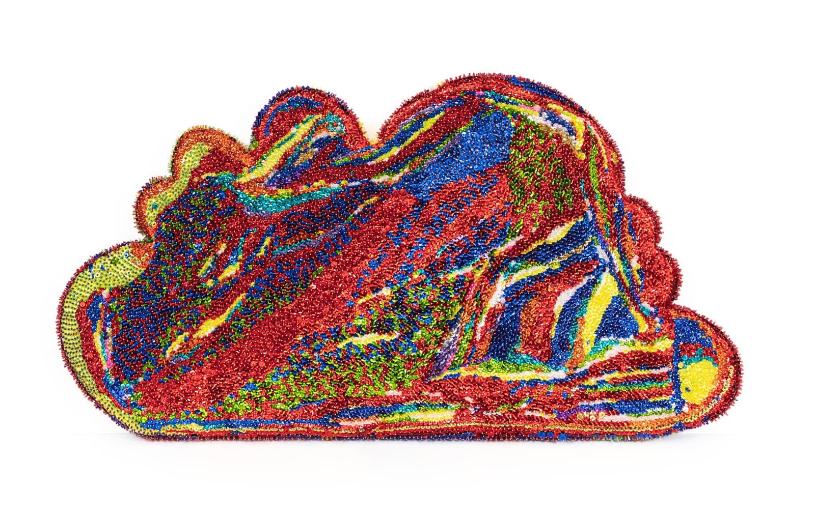 Cloud-shaped sculptural artwork densely covered in multicolor sequins, dominated by red, blue, green, and yellow.