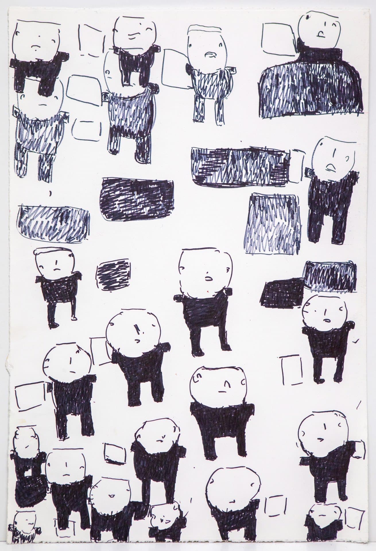 Pen drawing on white paper featuring repeated simple figures with round heads and dark scribbled bodies scattered across the page.