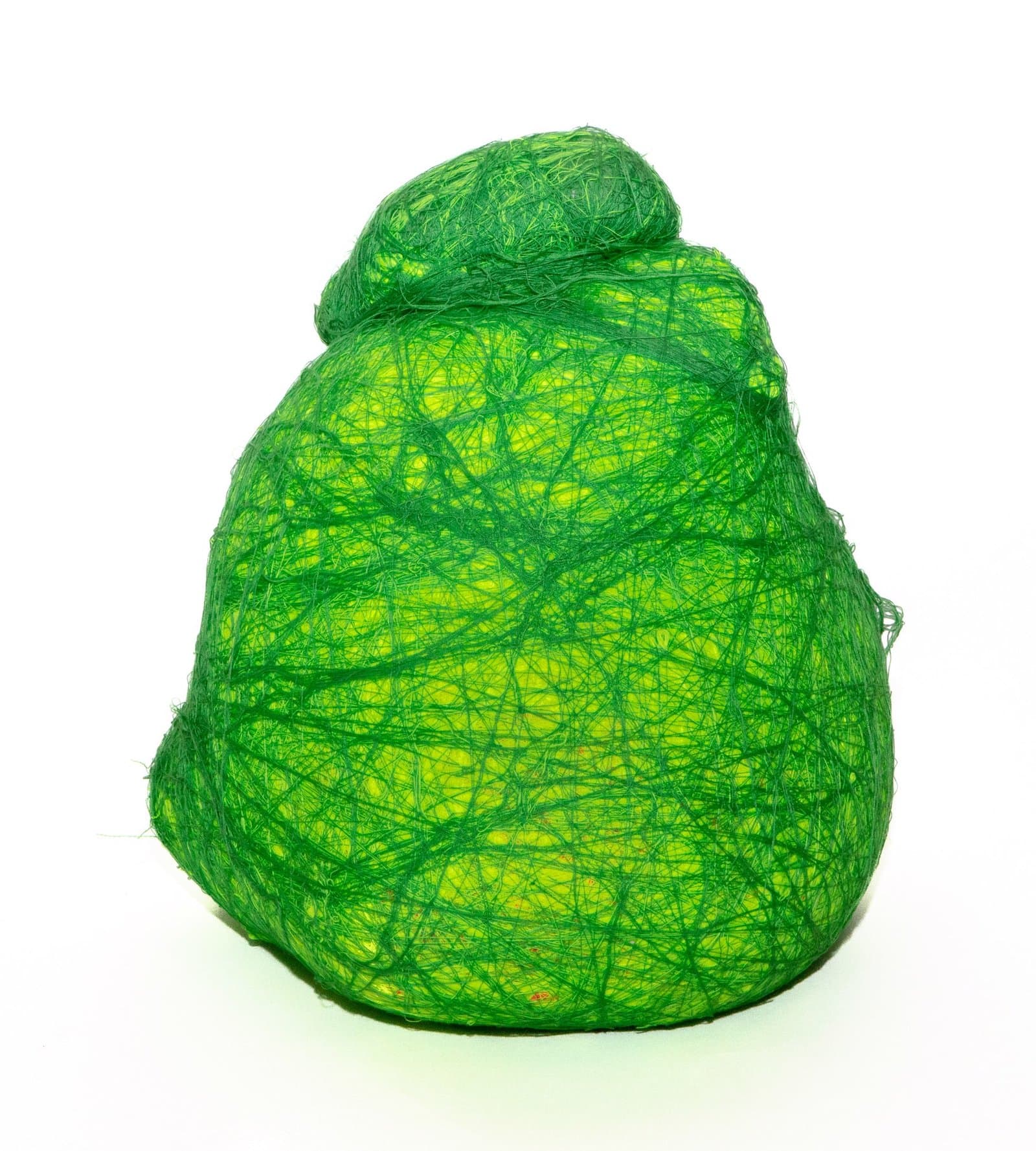 Fiber sculpture of green wrapped material forming an organic, bulbous shape against white background