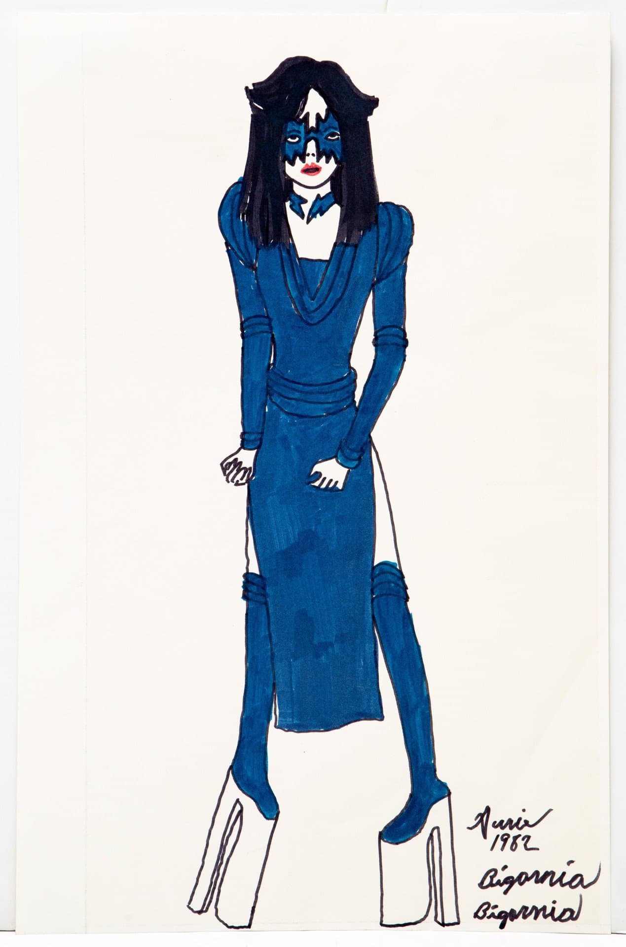 Ink drawing of figure in blue dress and boots with theatrical face paint, signed and dated 1982