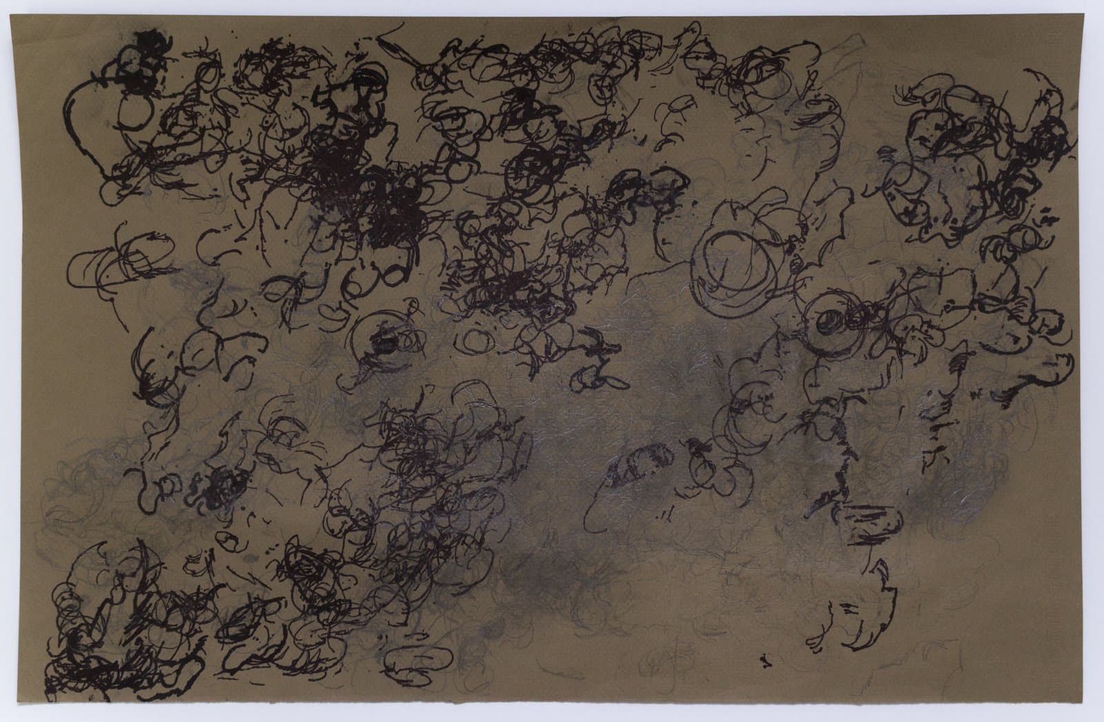 Abstract drawing with dense black looping marks and pale blue washes scattered across tan paper.