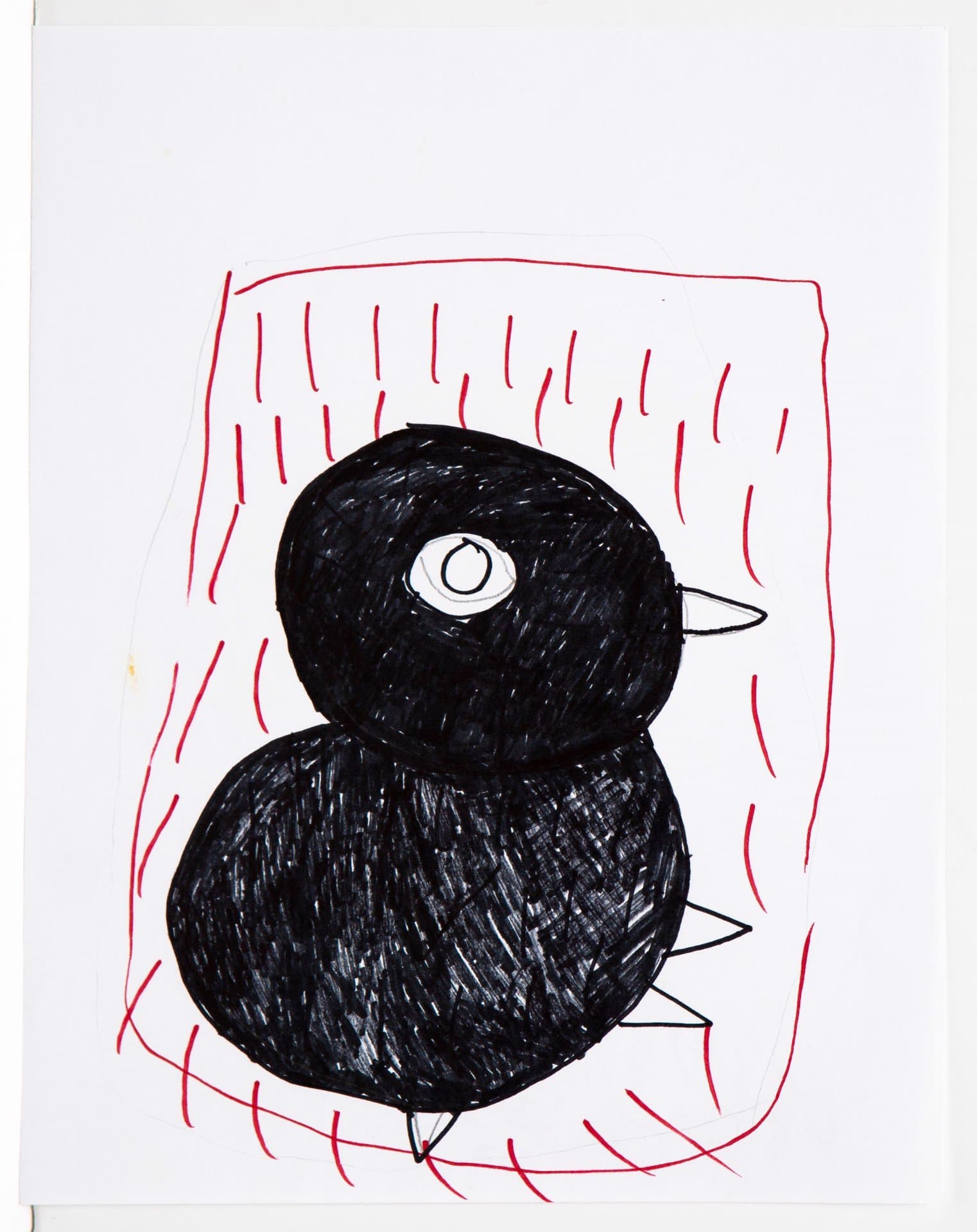 Drawing in pen of a black bird figure with white eye surrounded by red linear marks on white paper.