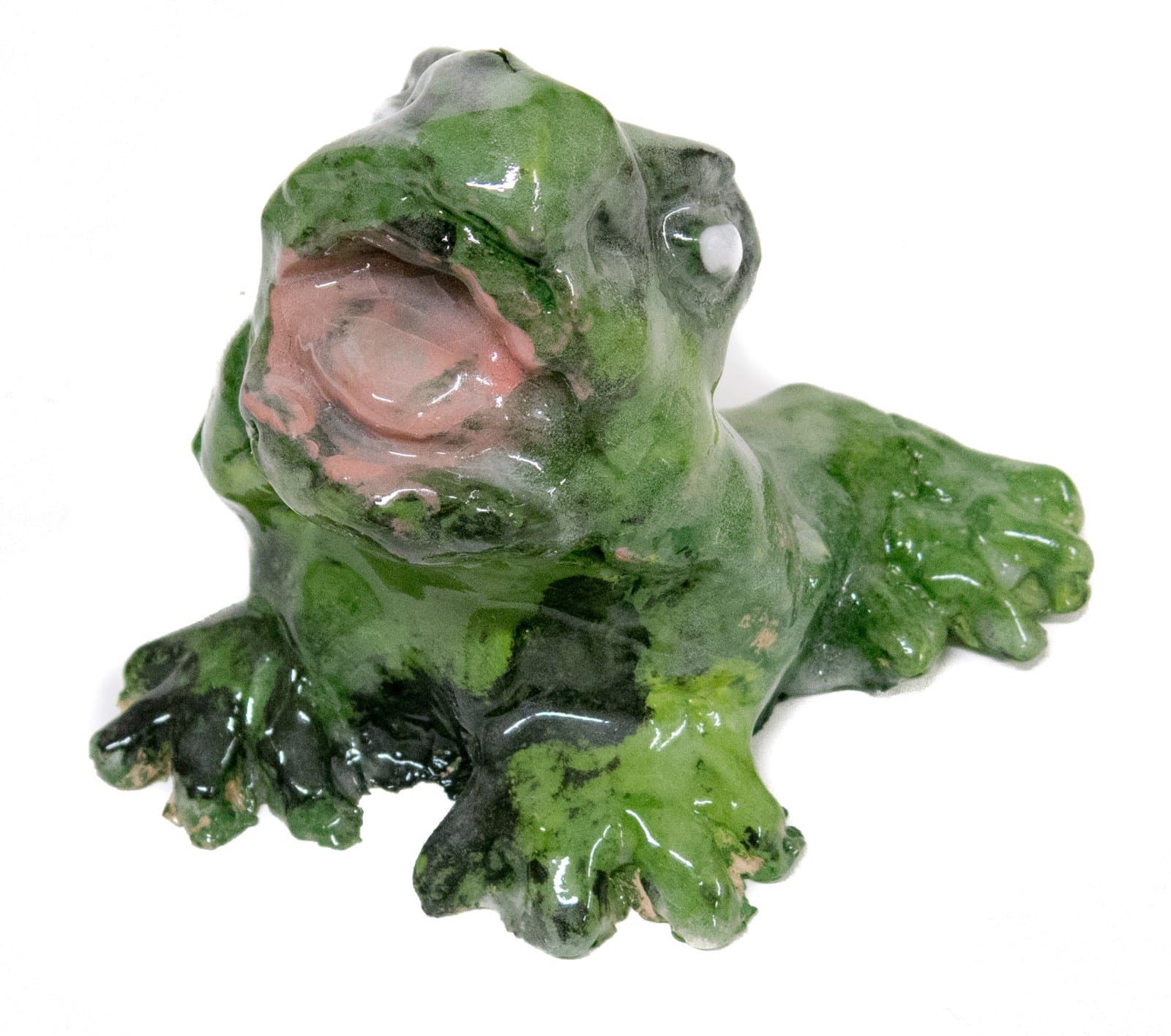 Ceramic sculpture of a frog with open mouth, glazed in mottled green with pink interior