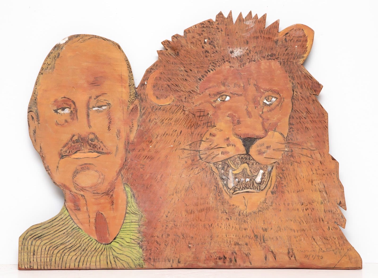 Acrylic painting on wood showing a bald man's profile next to a lion's head with detailed mane and visible fangs