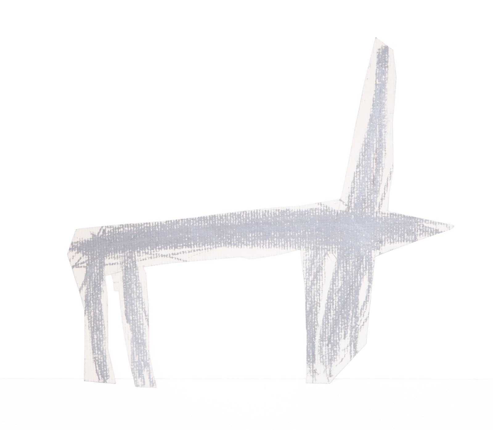 Drawing of a table in gray art stix on white paper cutout, showing rectangular top with four legs and vertical back element.