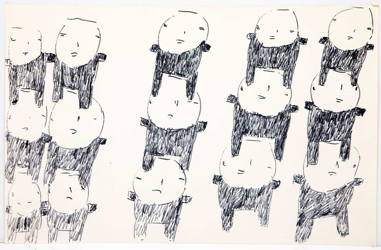 Pen drawing of multiple simplified human figures arranged in rows with dark shaded clothing and circular heads on paper.