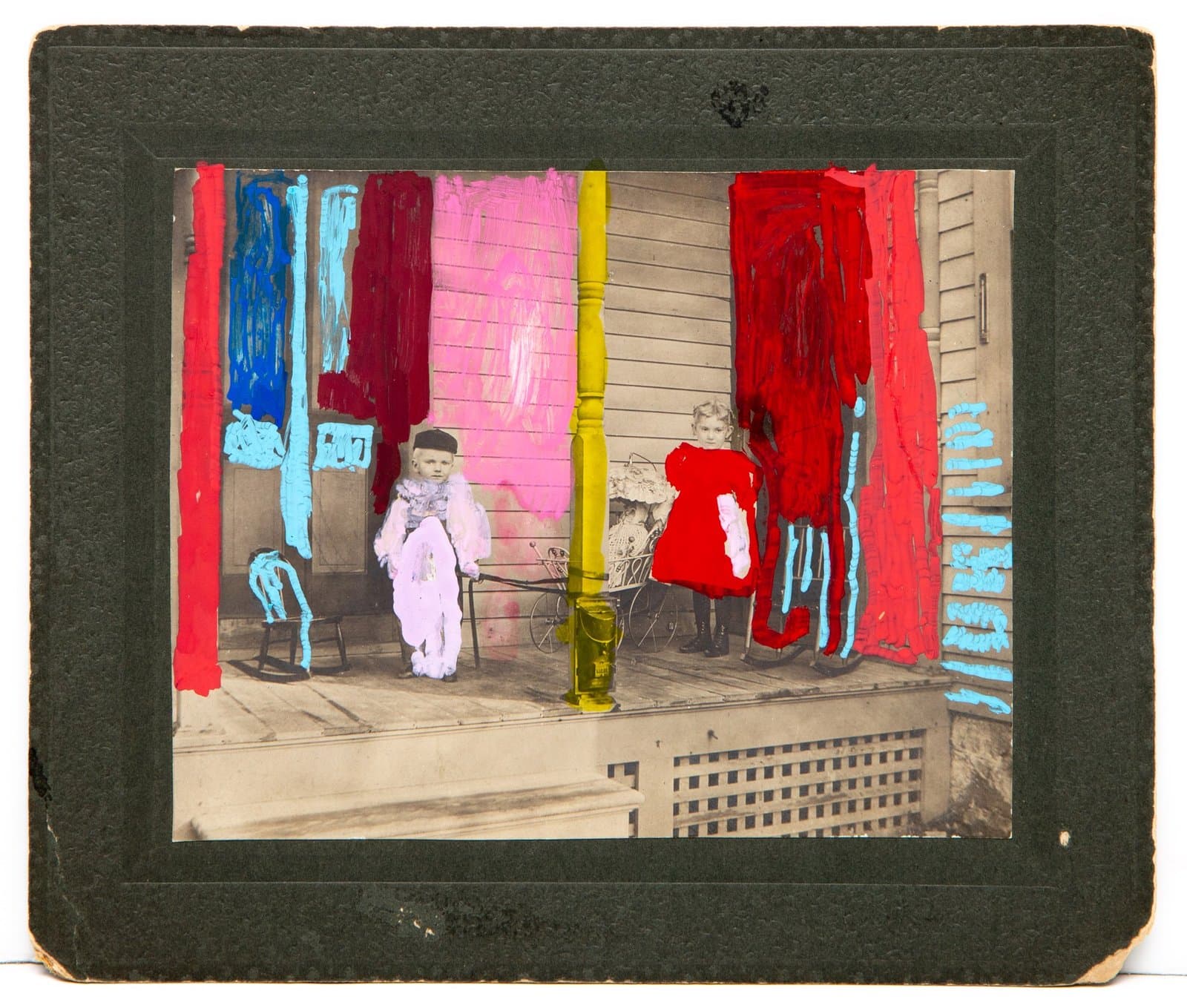 Mixed media artwork with acrylic paint over vintage photograph showing two children on wooden porch with colorful paint additions.