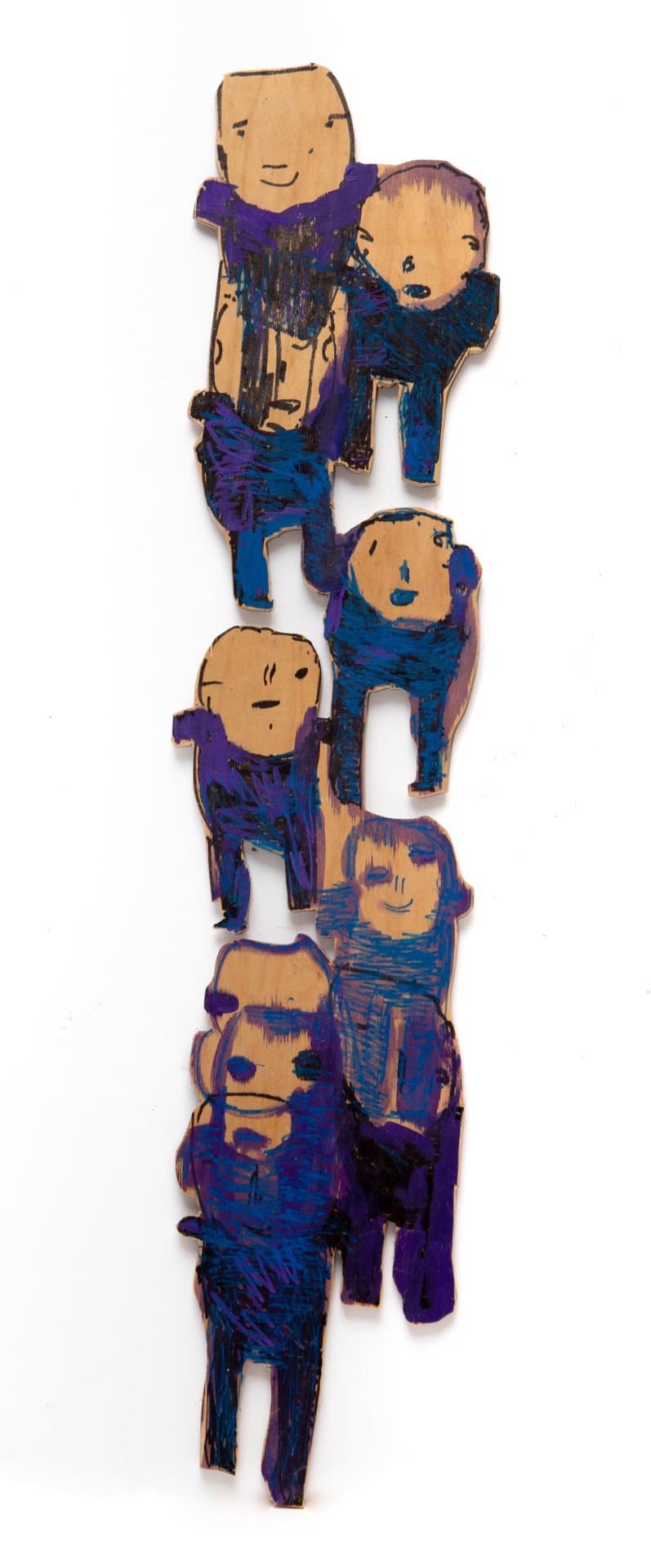 Cut wood sculpture of seven interconnected human figures painted in blue and purple acrylic with tan faces.